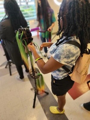 Youth participating in a hands-on learning program
