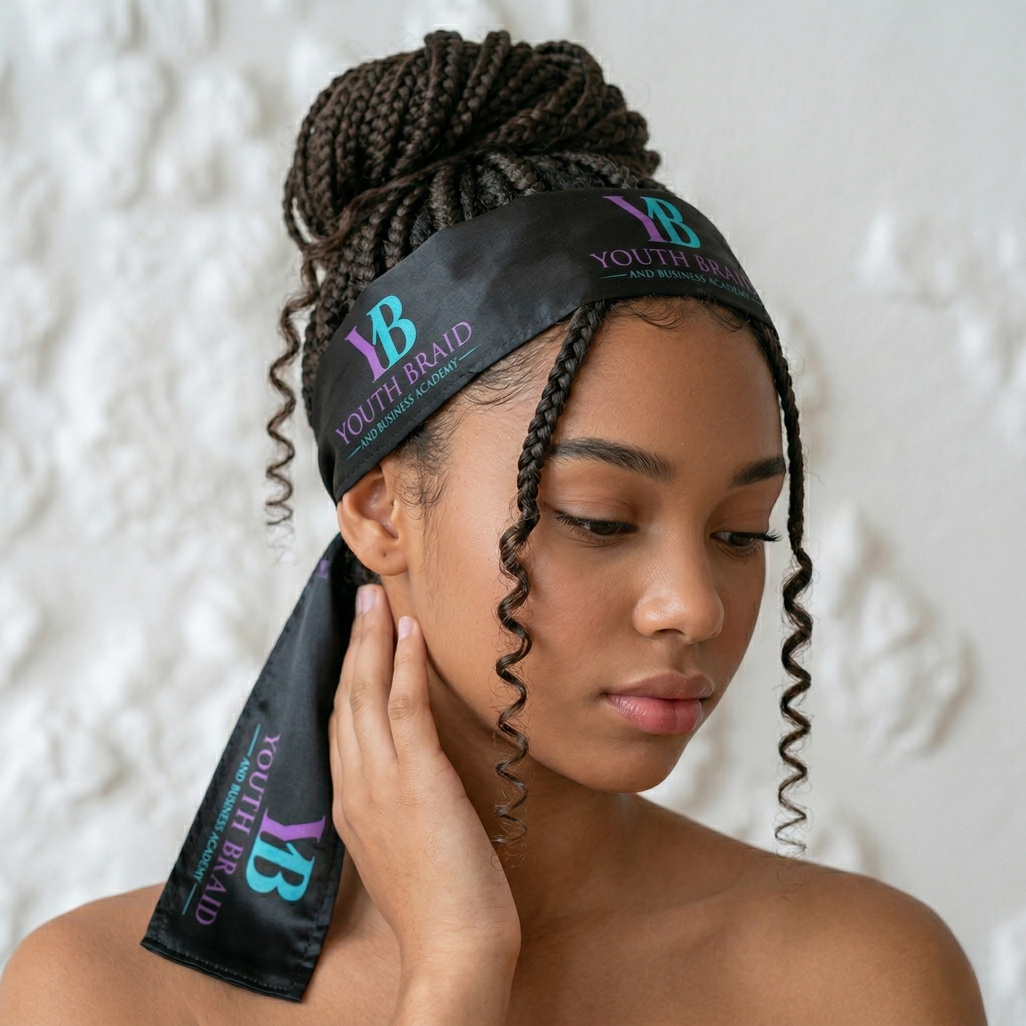 Youth Braid edge scarf worn by a student