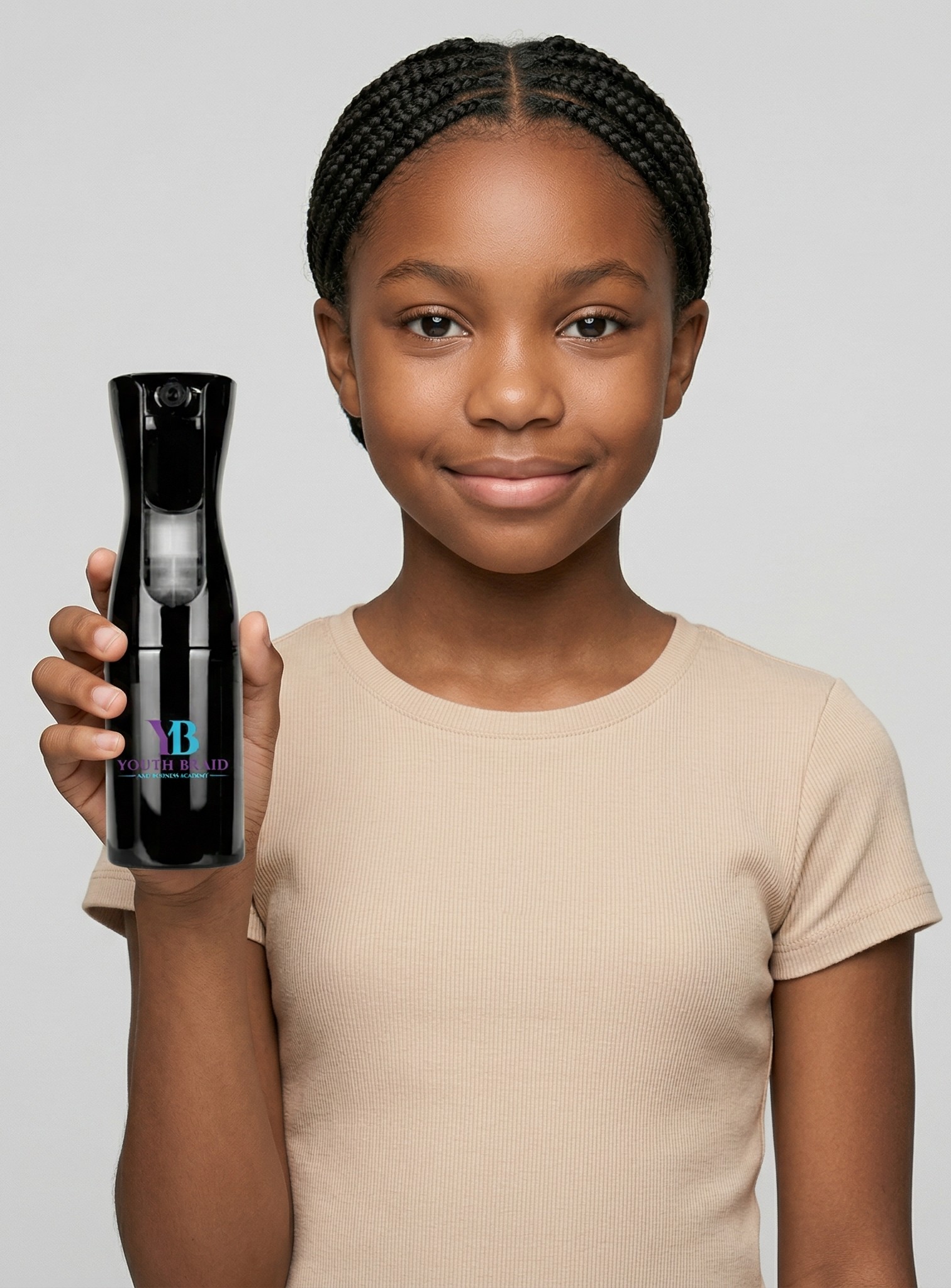 Youth Braid spray bottle held by a student