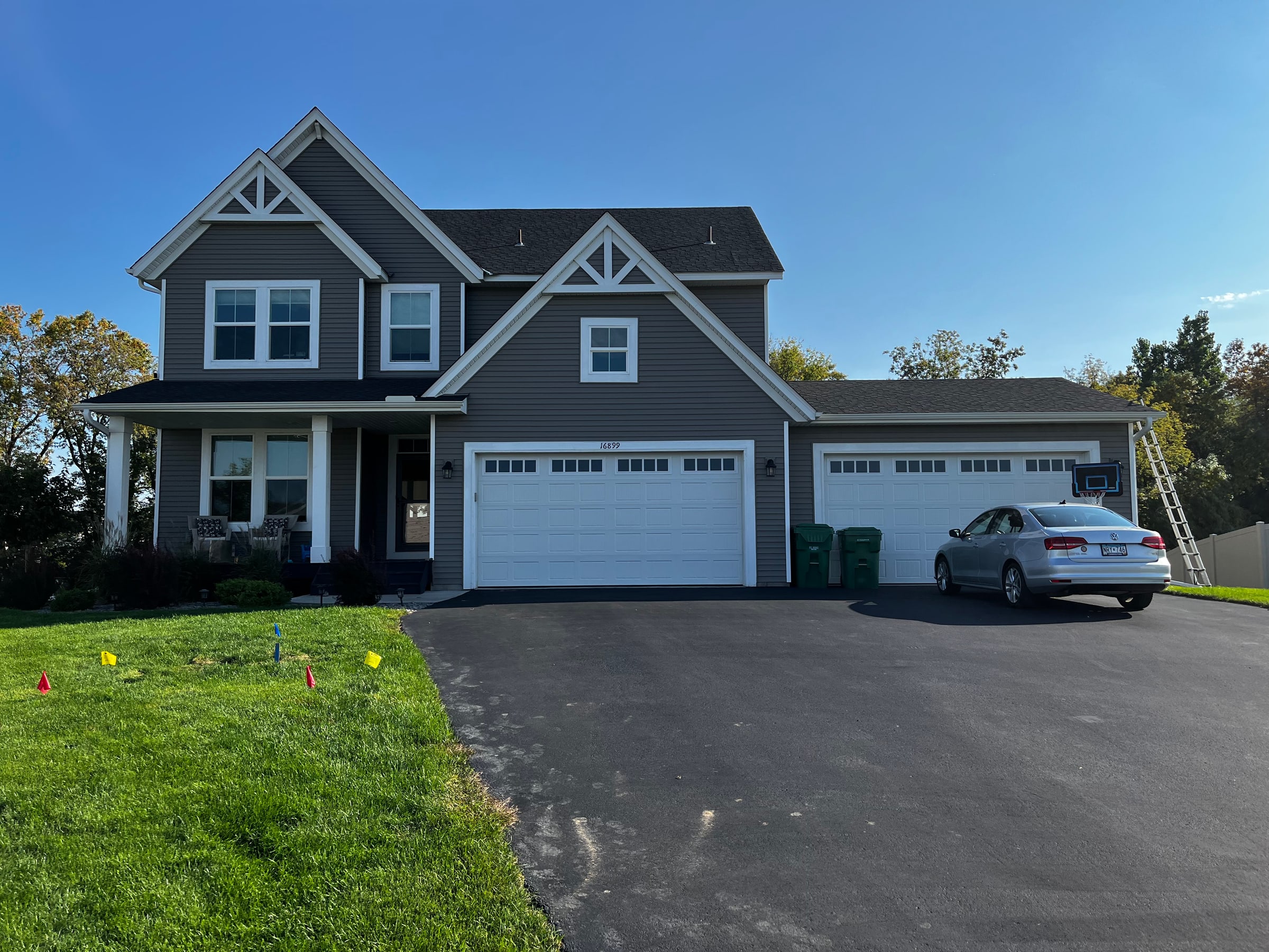 Completed dark shingle roof on a Nebraska home