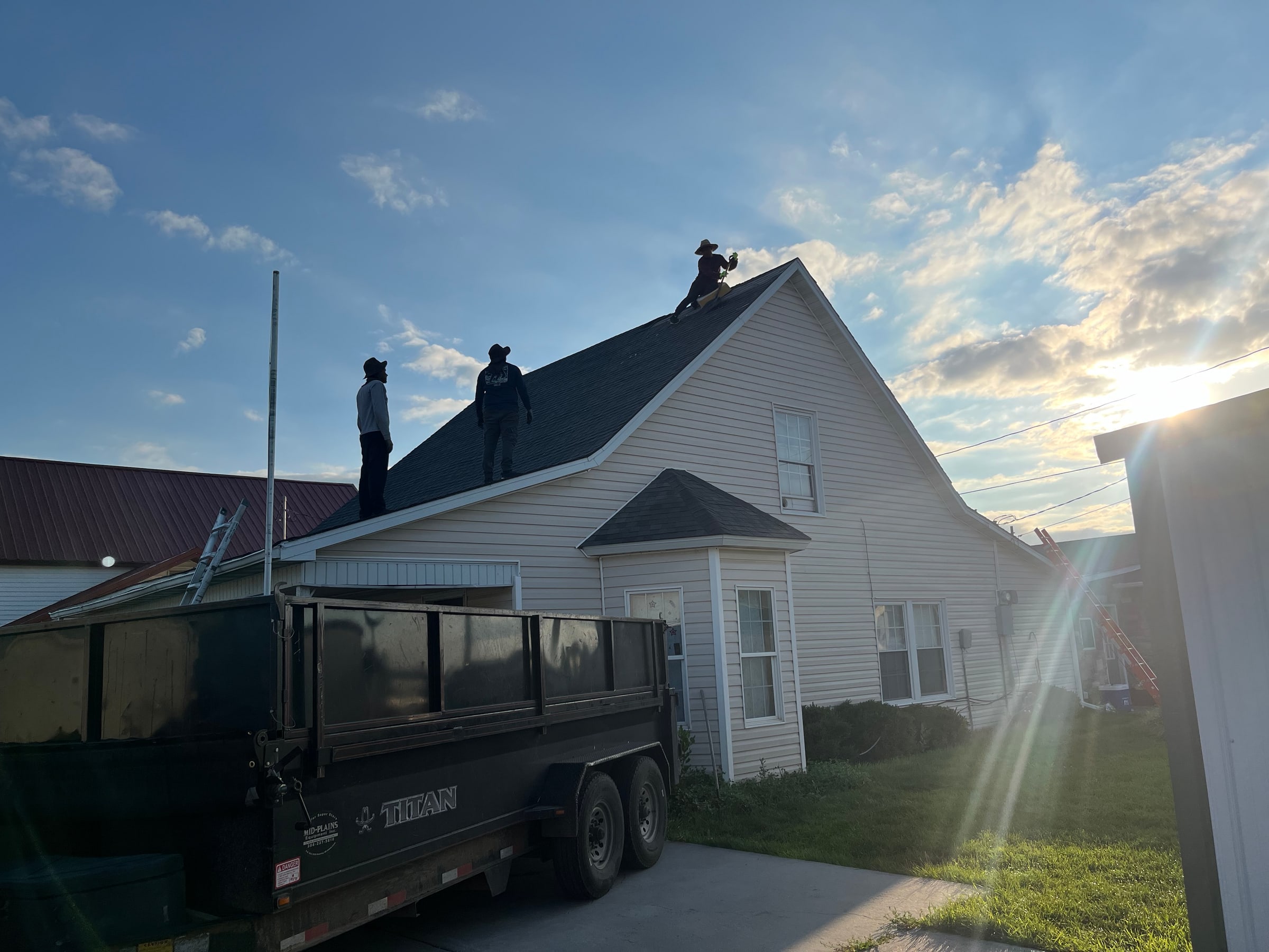 ROOF911 crew installing a residential roof