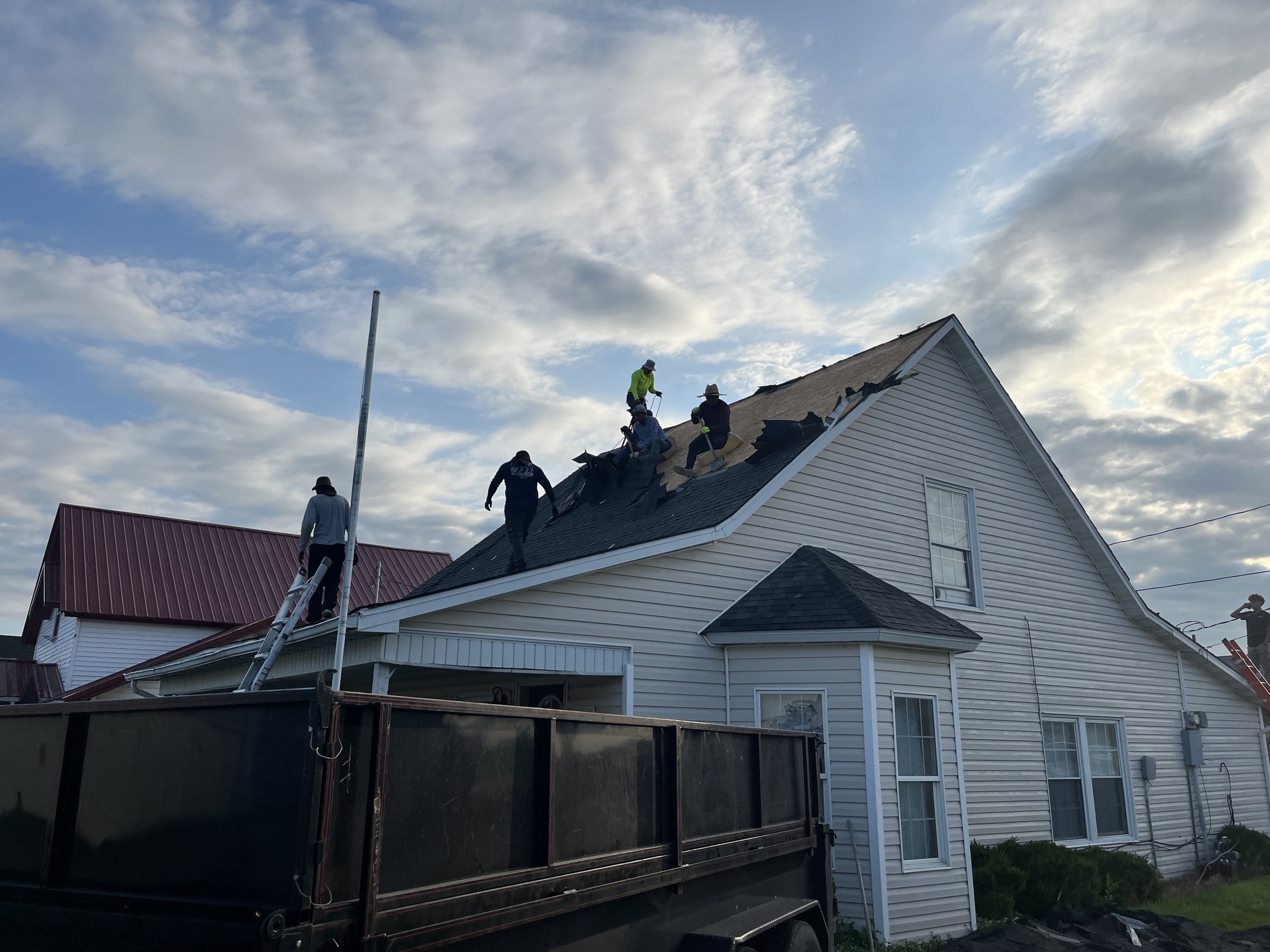 ROOF911 crew preparing a residential roof replacement