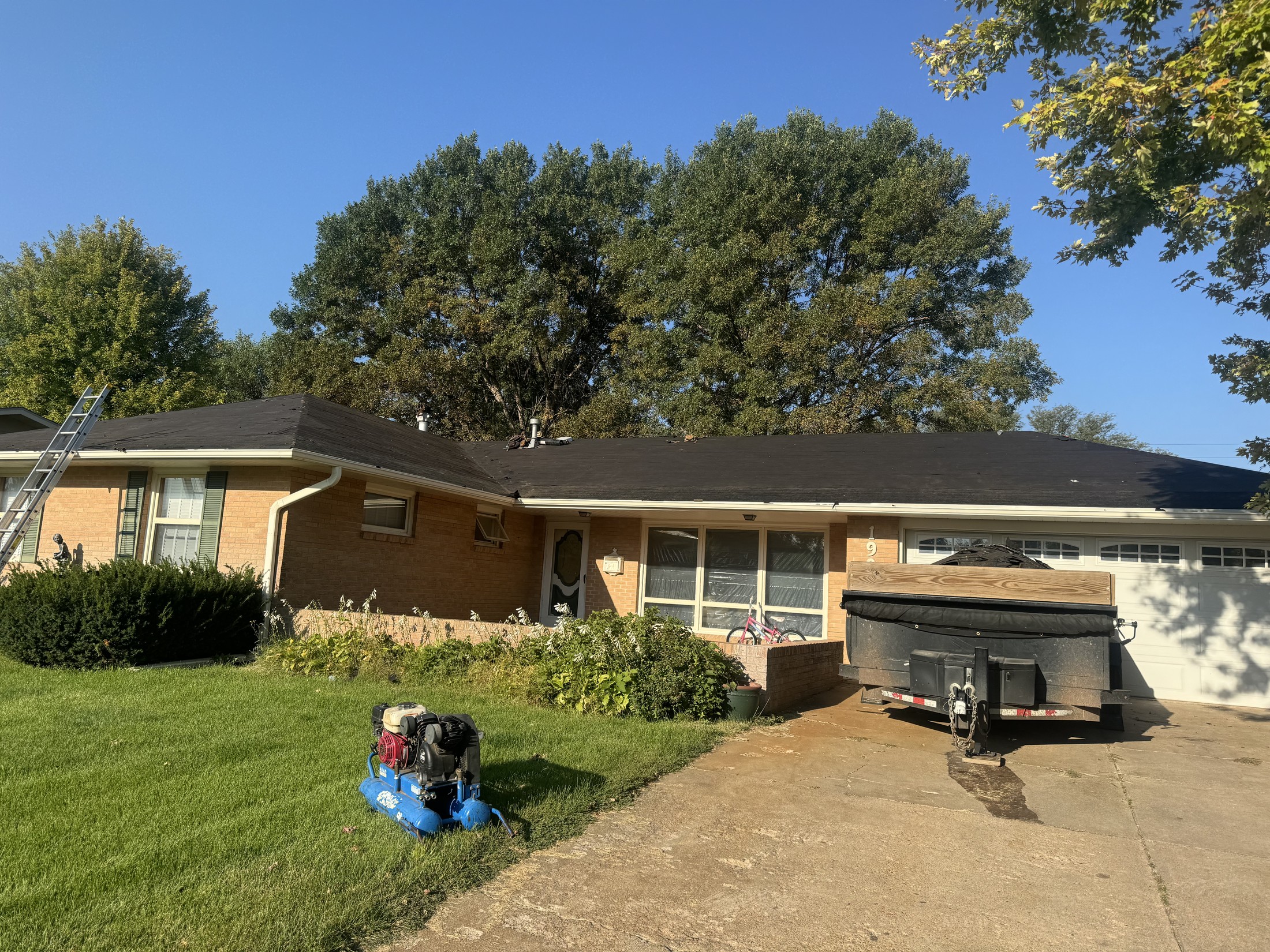 Residential roof replacement in progress