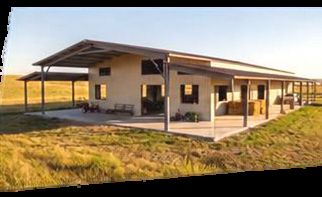 Illustration of a building with a wraparound covered porch