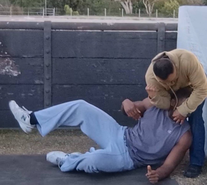 Vinny Cruz demonstrating ground-defense technique