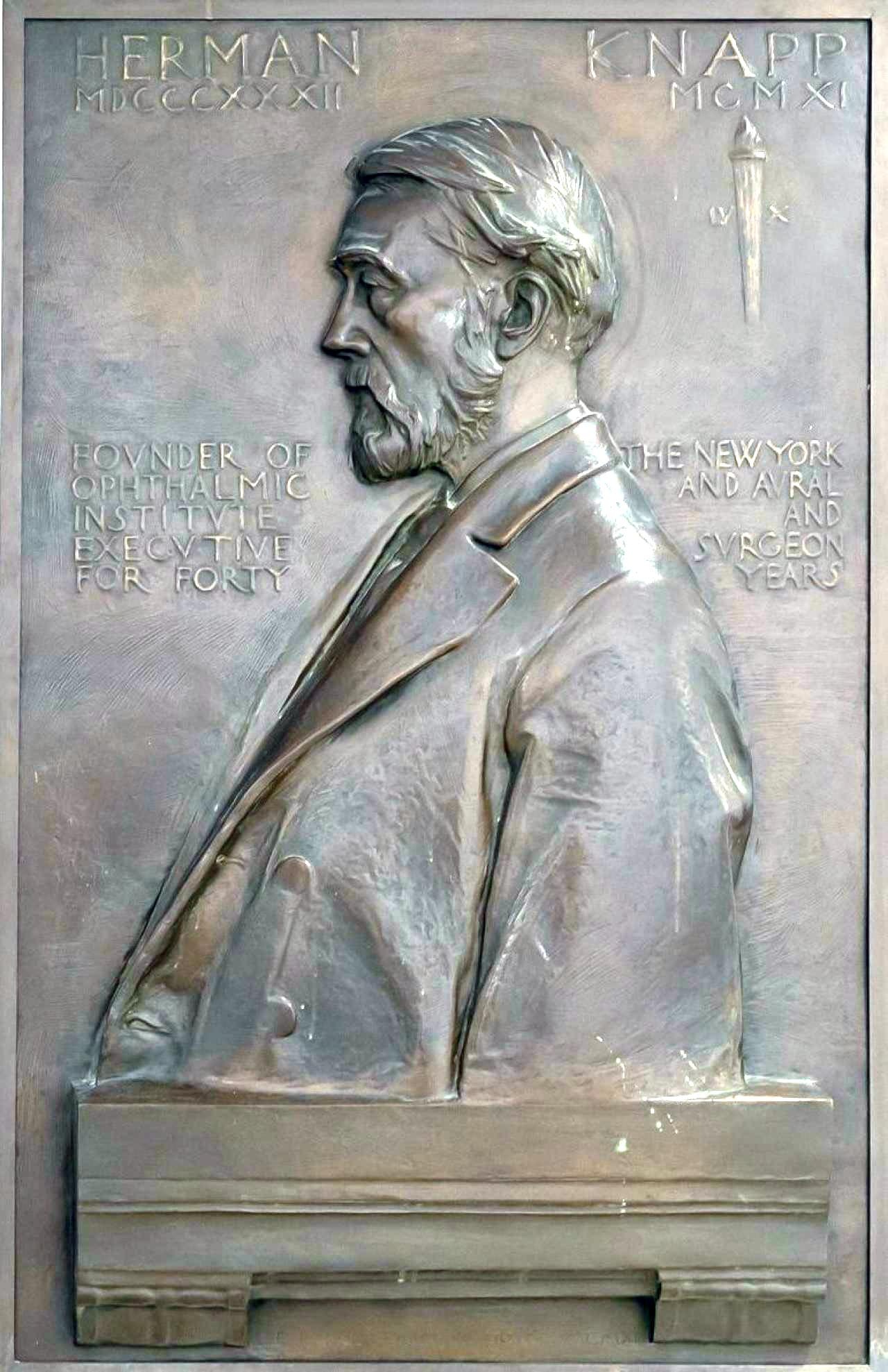 Bronze memorial tablet portraying Dr. Herman Knapp in profile, by Lee Lawrie, 1913.