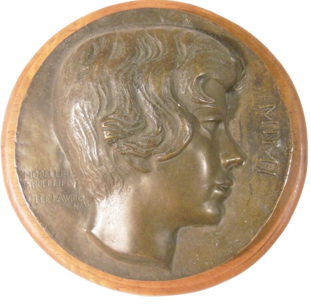 Mimi, a circular sculpted portrait of a young girl in profile, signed Lee Lawrie.