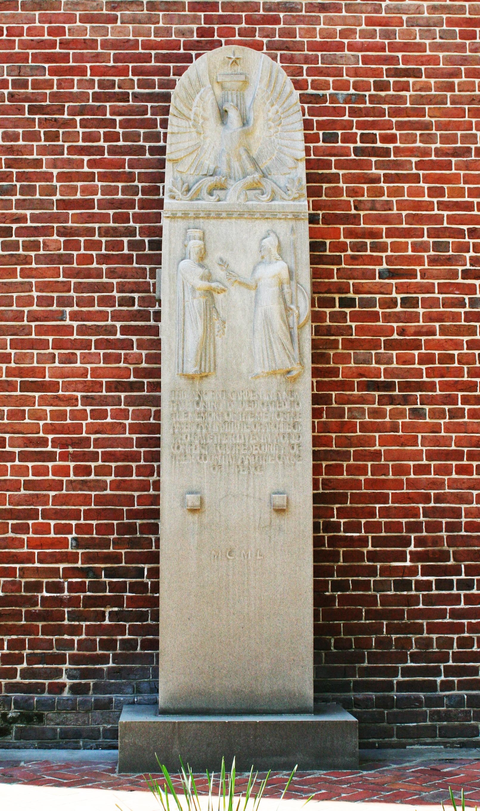 The complete World War II Architects’ Monument against a brick wall at the AIA headquarters in Washington, D.C.
