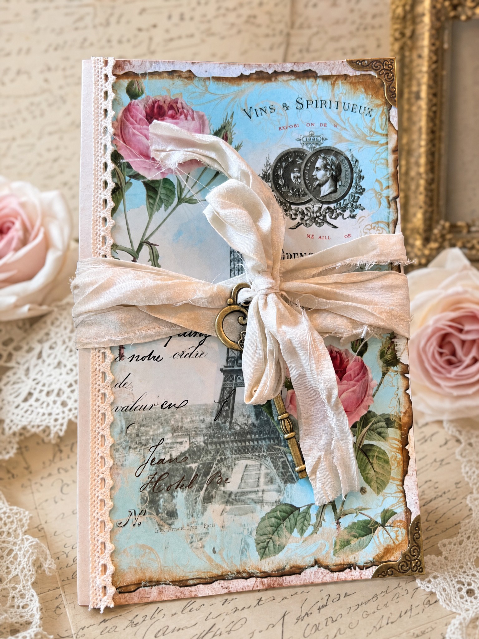 Paris Rose Ephemera Holder displayed with French script papers, roses, lace, and an antique gilt frame