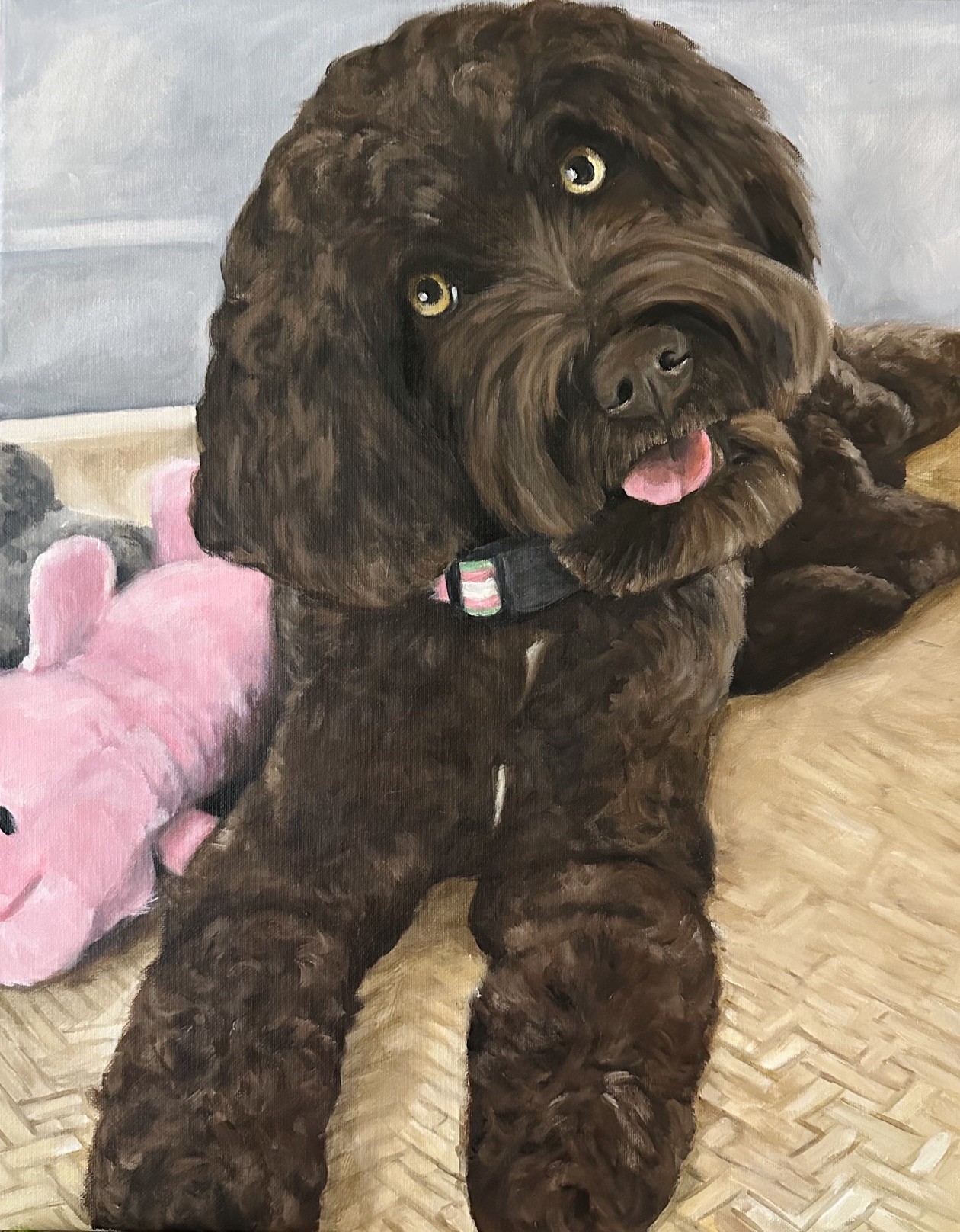 Black doodle portrait with a bright pink toy
