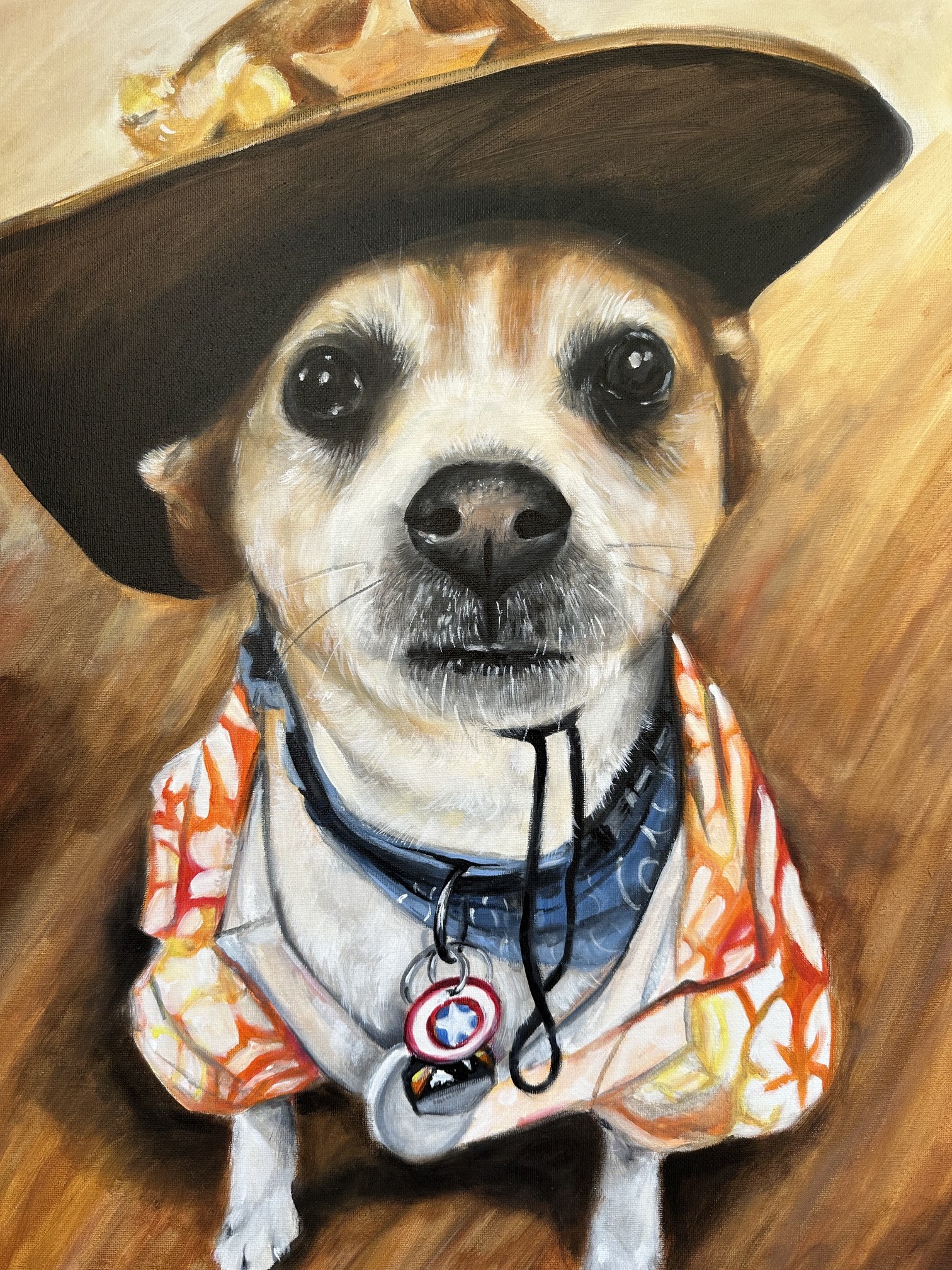 Dog portrait wearing a cowboy hat with a bright, expressive face