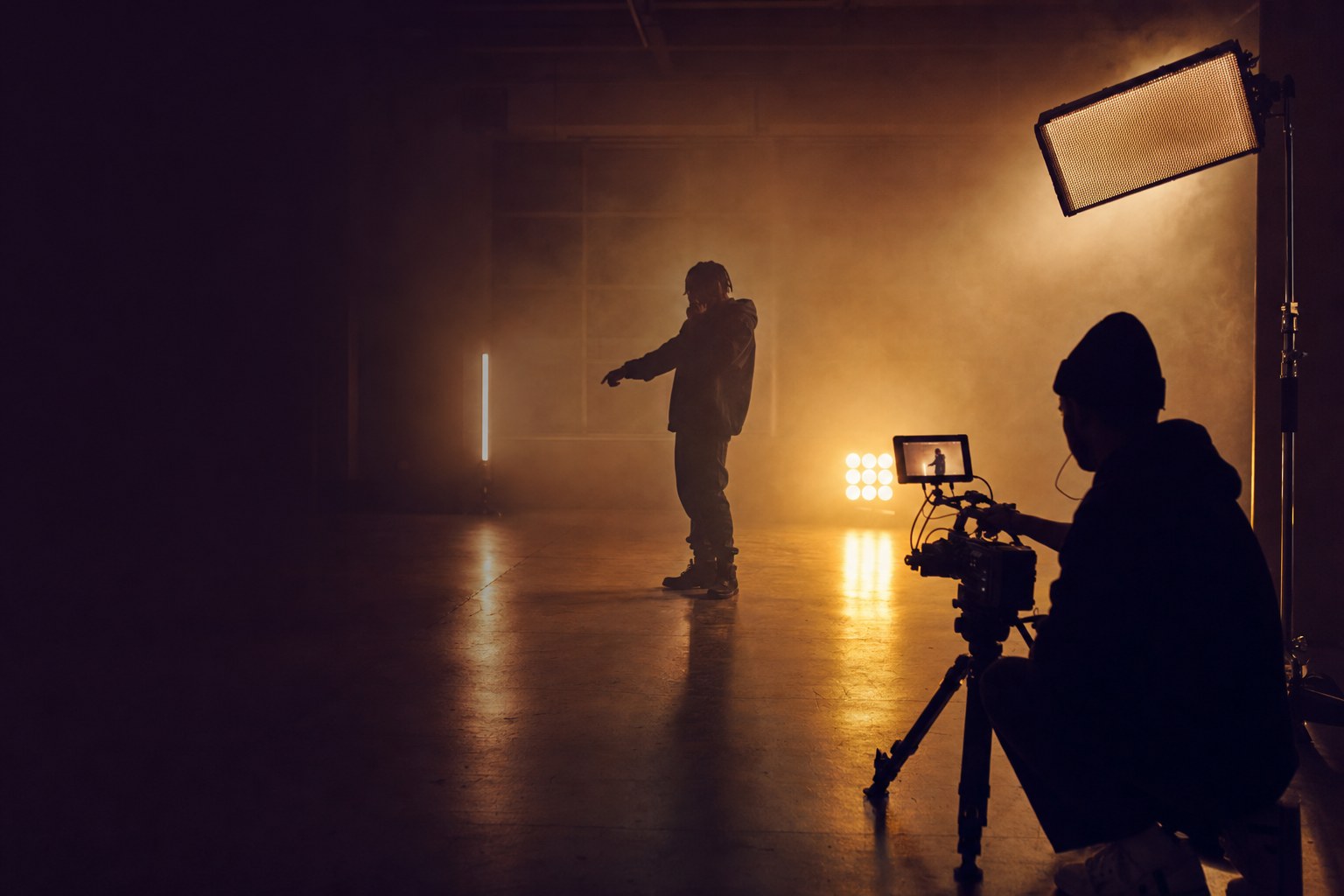 Independent artist filming a music video in a studio