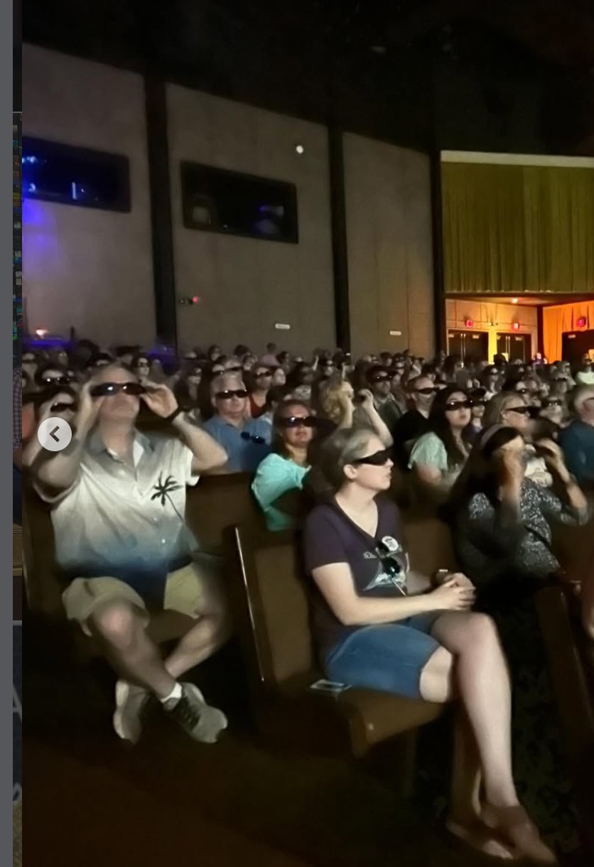 Audience members wearing 3D glasses at a Kristy Sellars performance