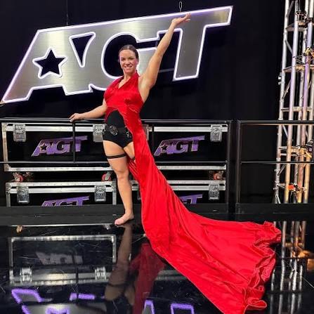 Kristy Sellars backstage at America’s Got Talent in a red gown
