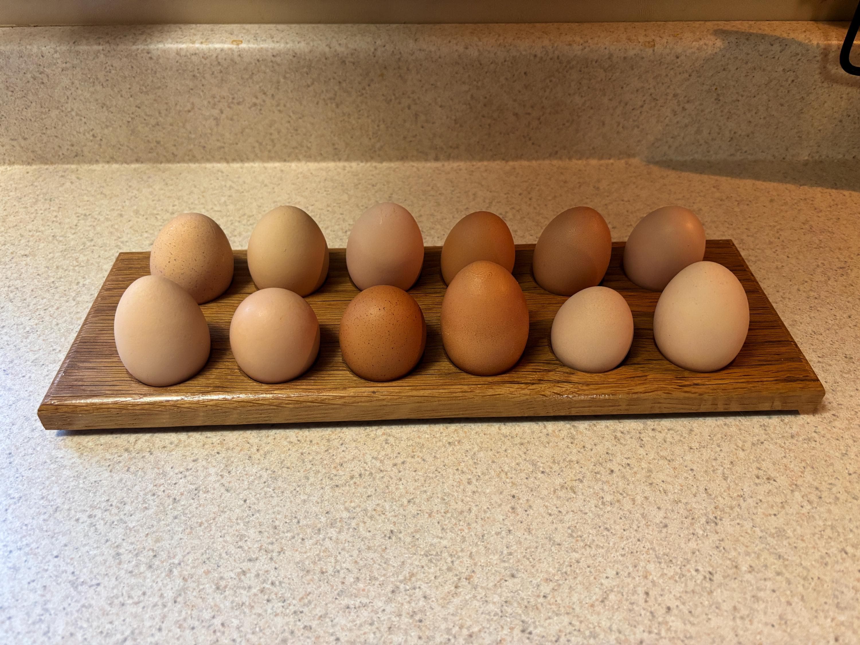 Angled view of a reclaimed oak egg tray