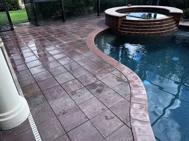 Stripping old sealer off pool deck pavers in Bonita Springs, FL