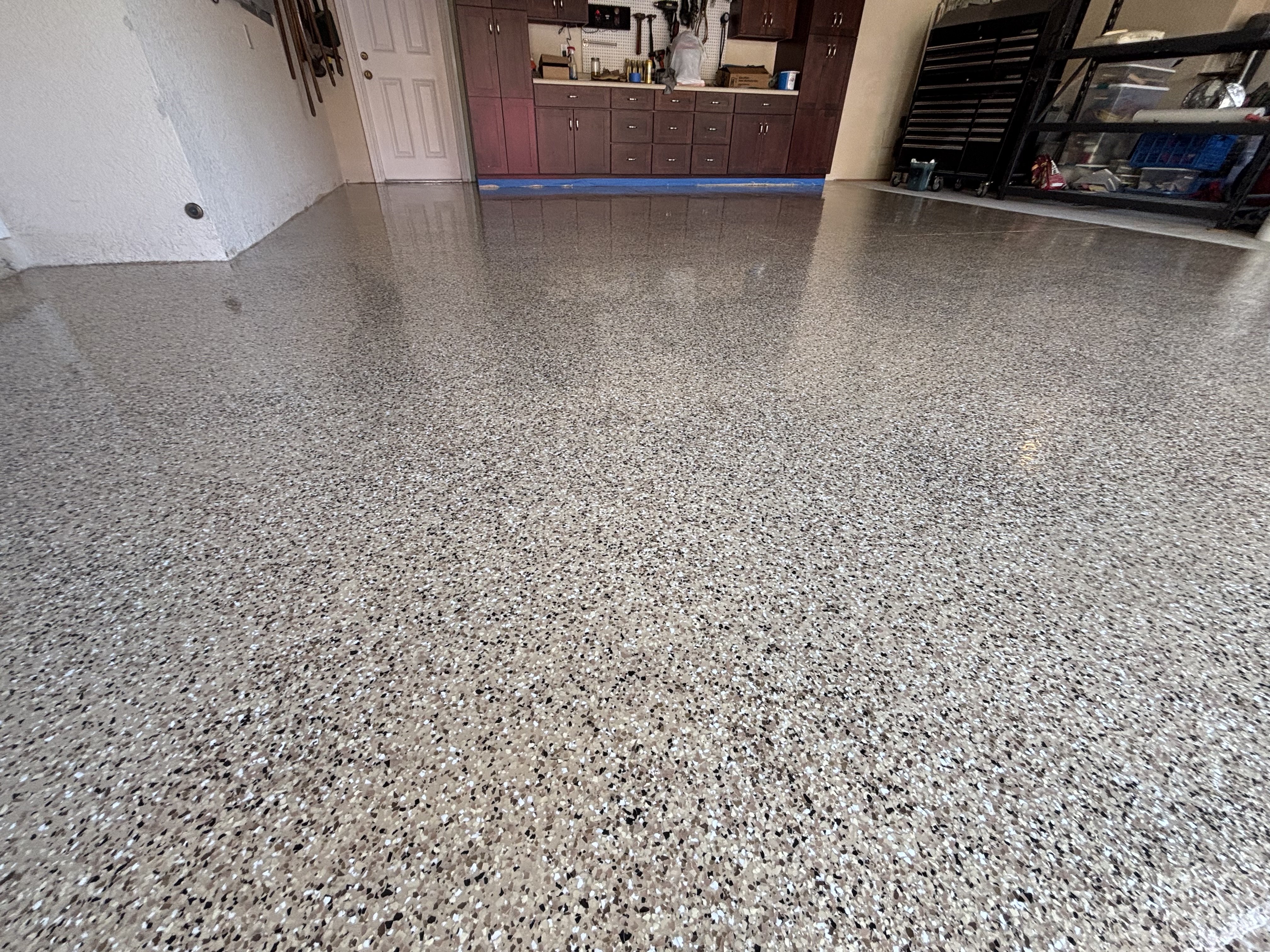 Finished garage floor with a decorative flake coating