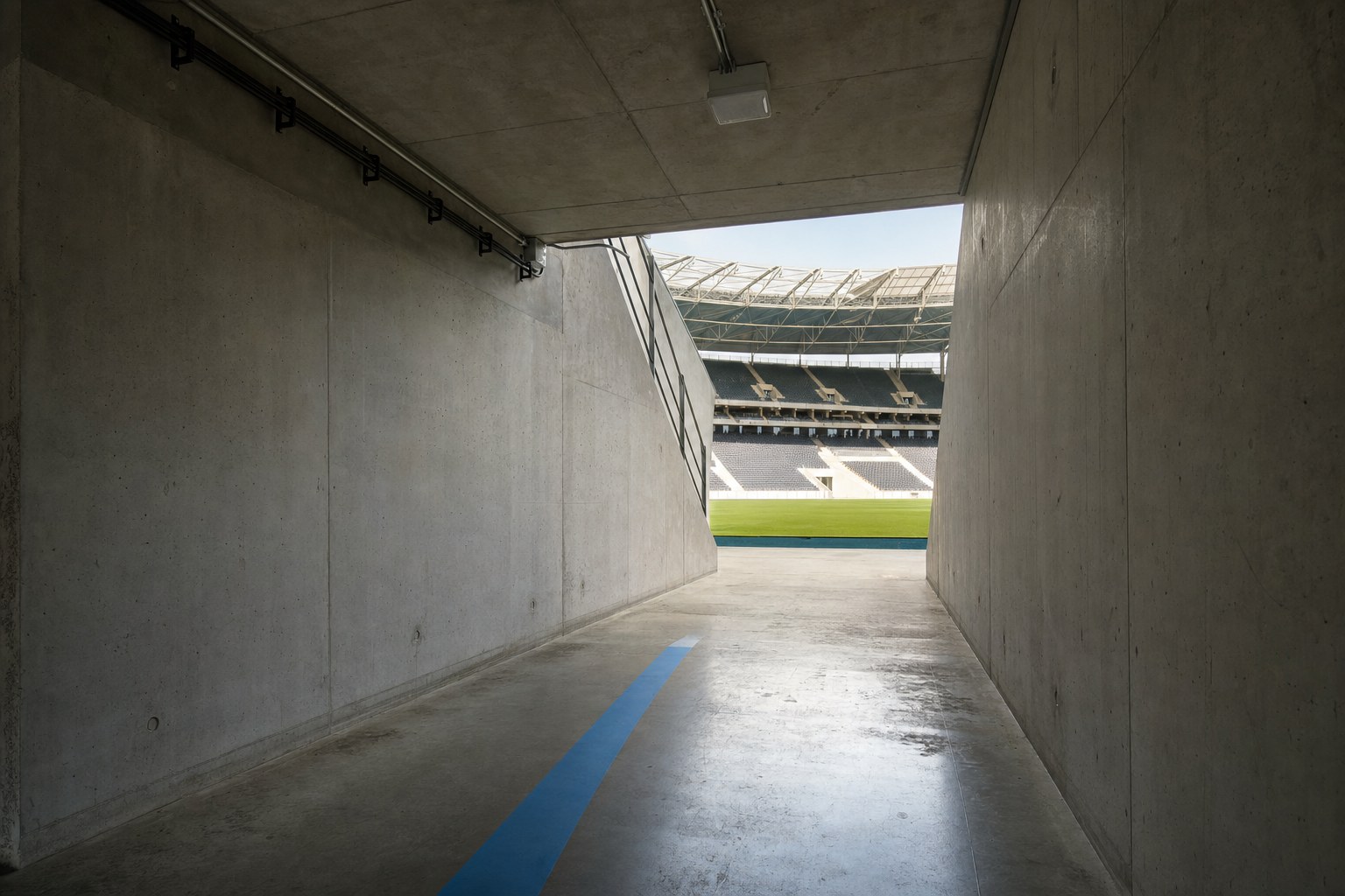 Football stadium tunnel leading to the pitch
