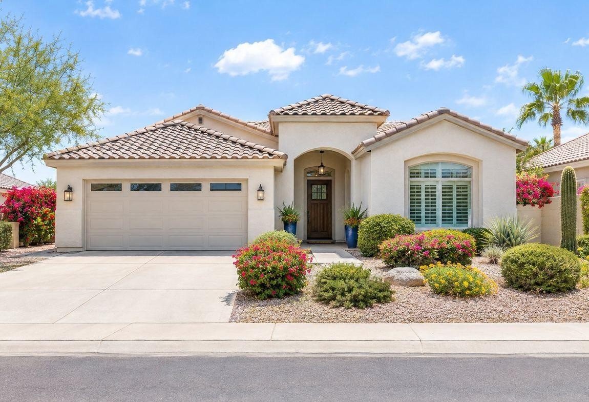 Illustrative single-story home with a tile roof and tidy landscaping, from Robin’s Chandler and Gilbert guide