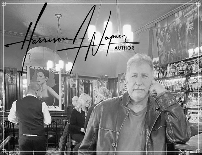 Harrison Napier writing at a Paris café
