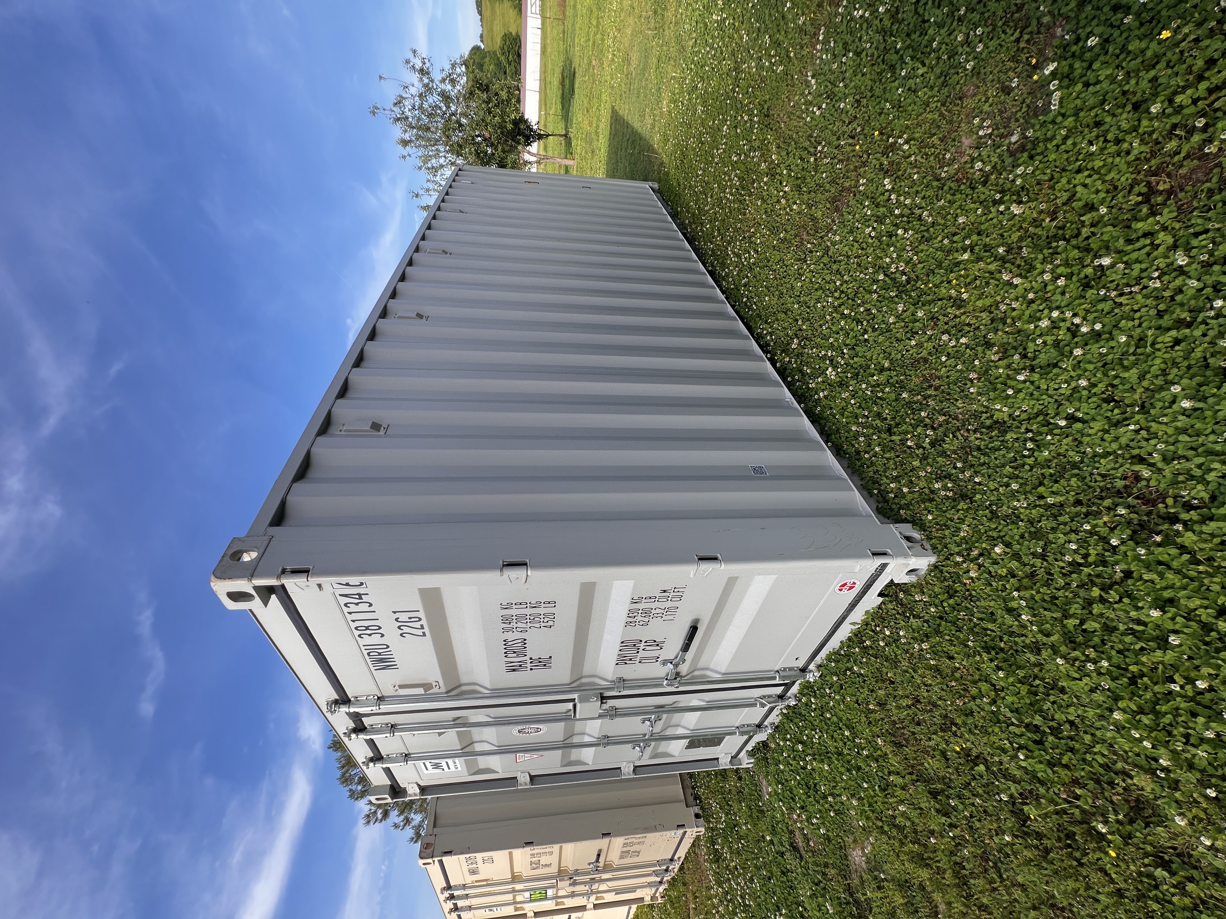 Shipping container set on a prepared property site