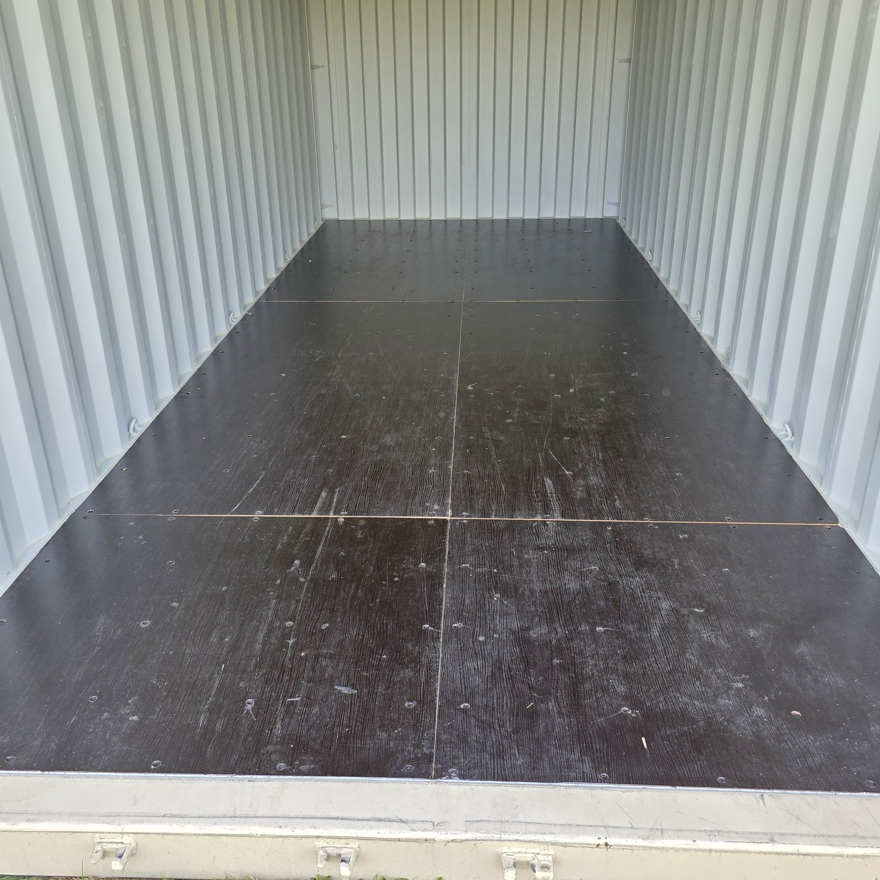 Shipping container with clear access around the doors