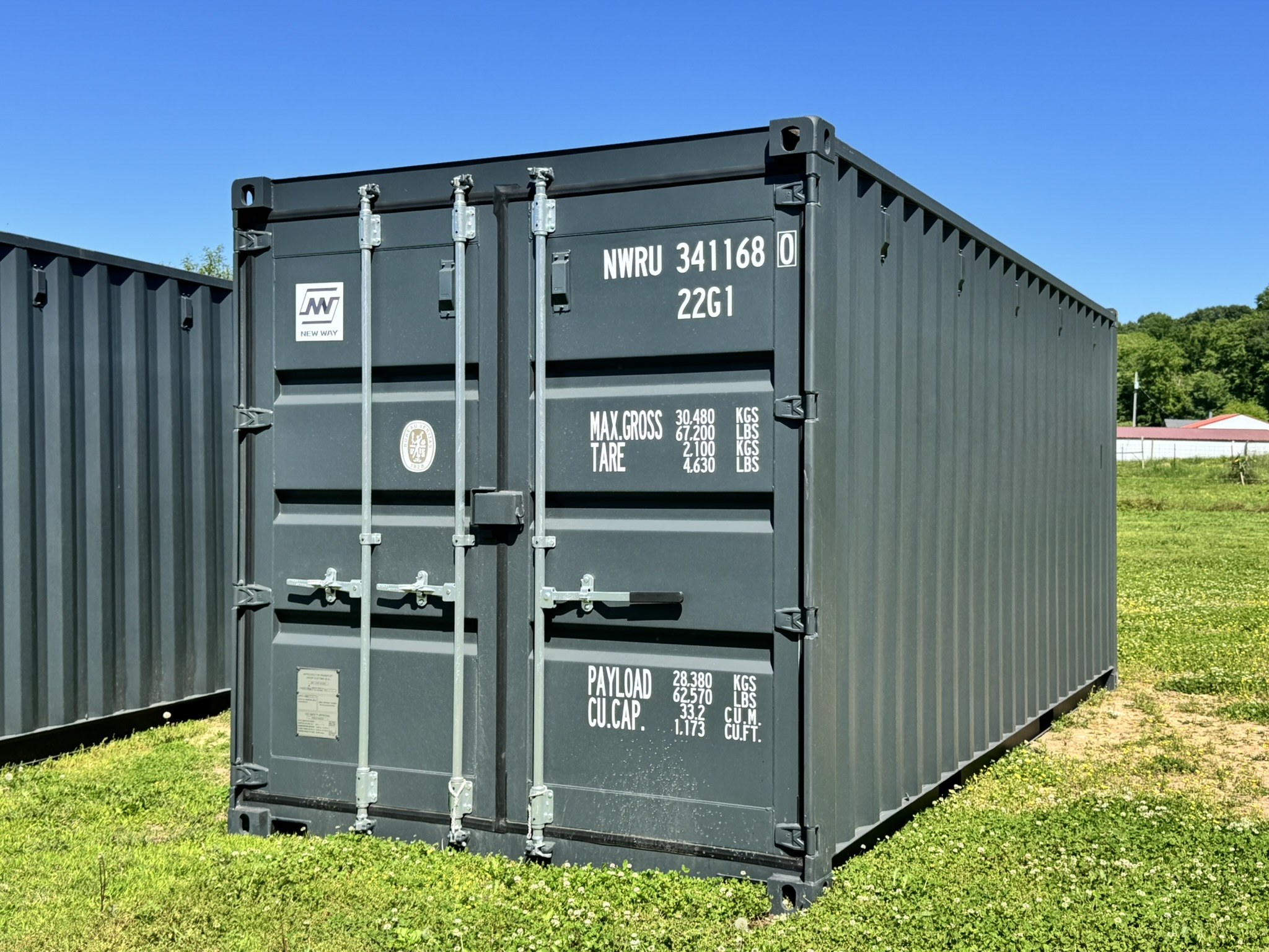 Shipping containers lined up at Wood Tech Structures in Wyandotte, Oklahoma
