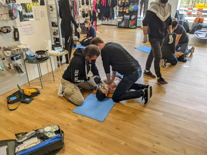 Participants practicing CPR during hands-on training