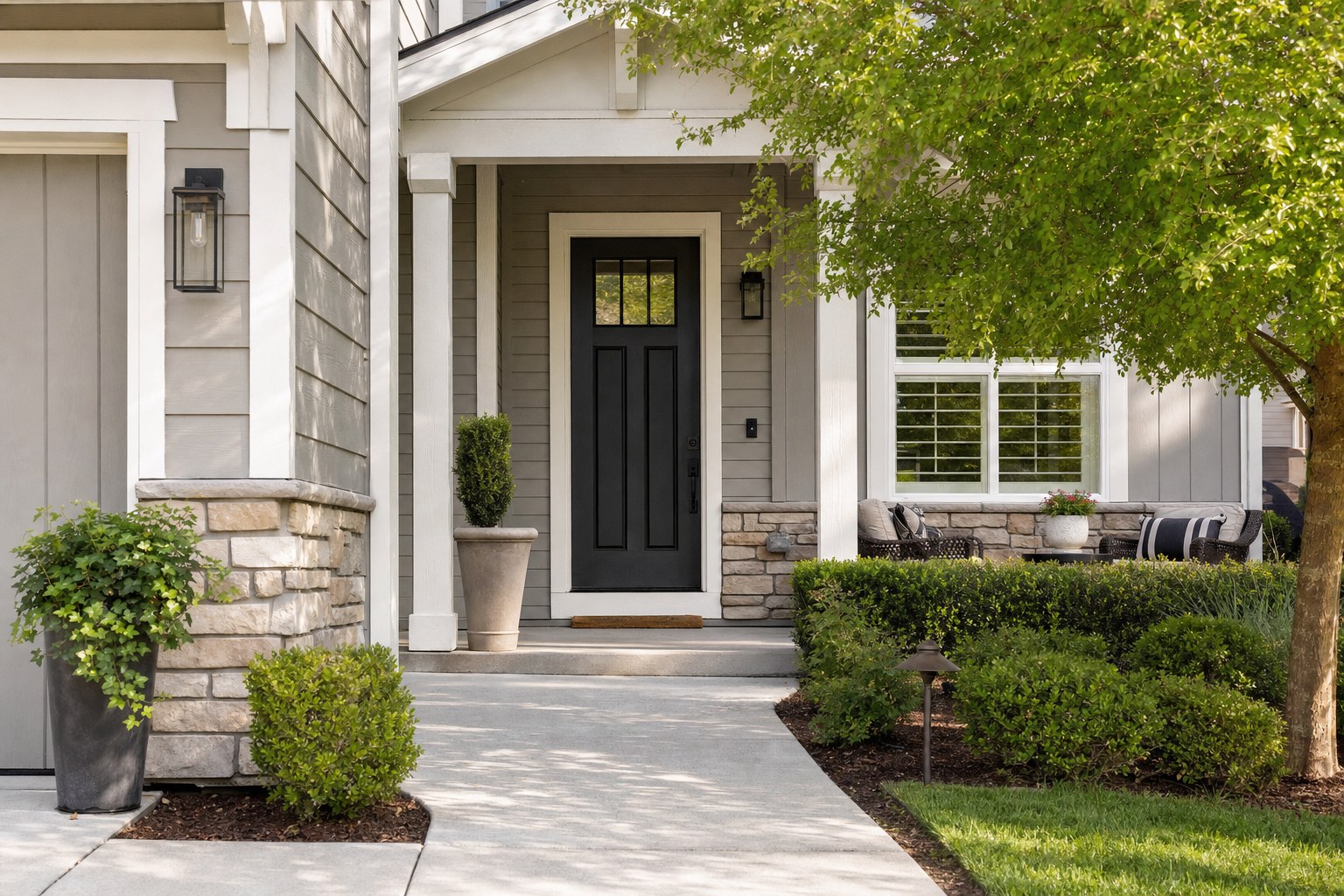 A tidy front entry with a clear walkway and welcoming porch