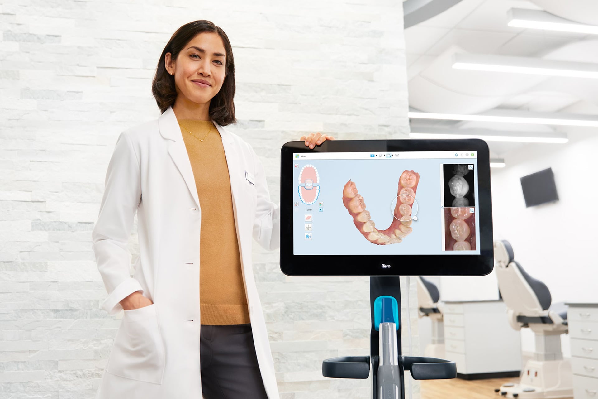 Orthodontist using a digital scanner