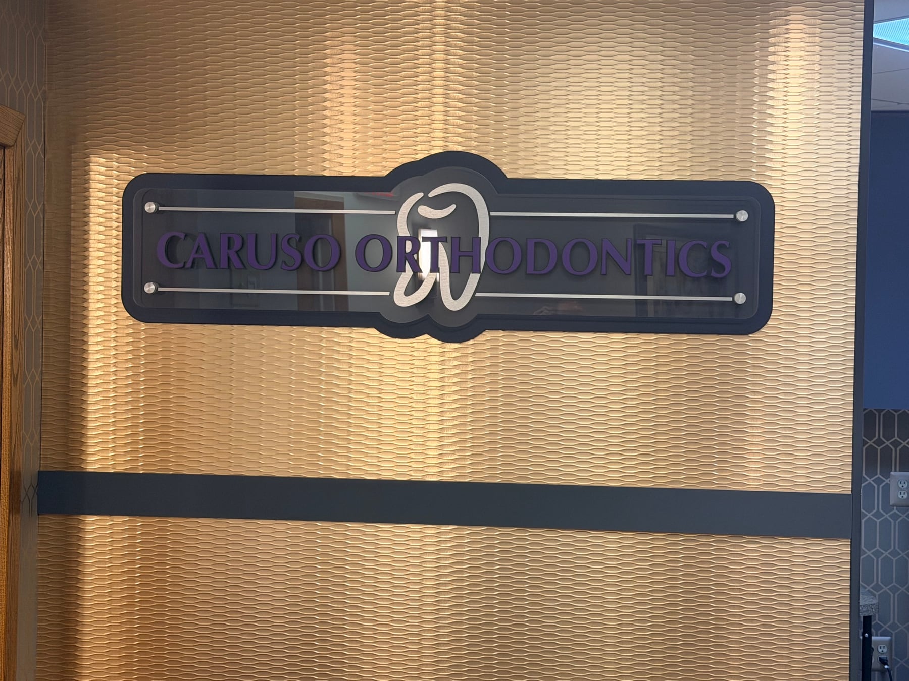 Caruso Orthodontics sign in New Hartford