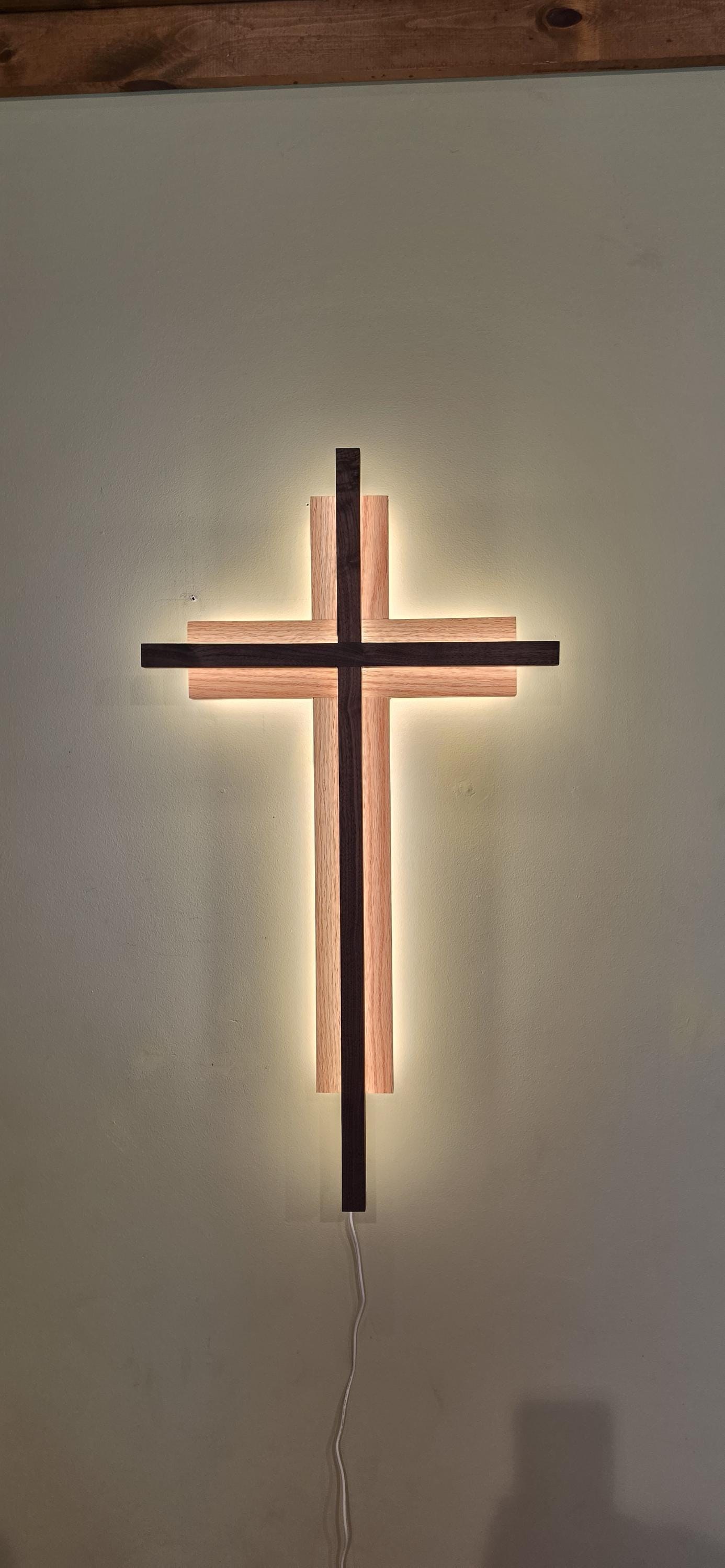 Detail of a handcrafted lighted wood cross