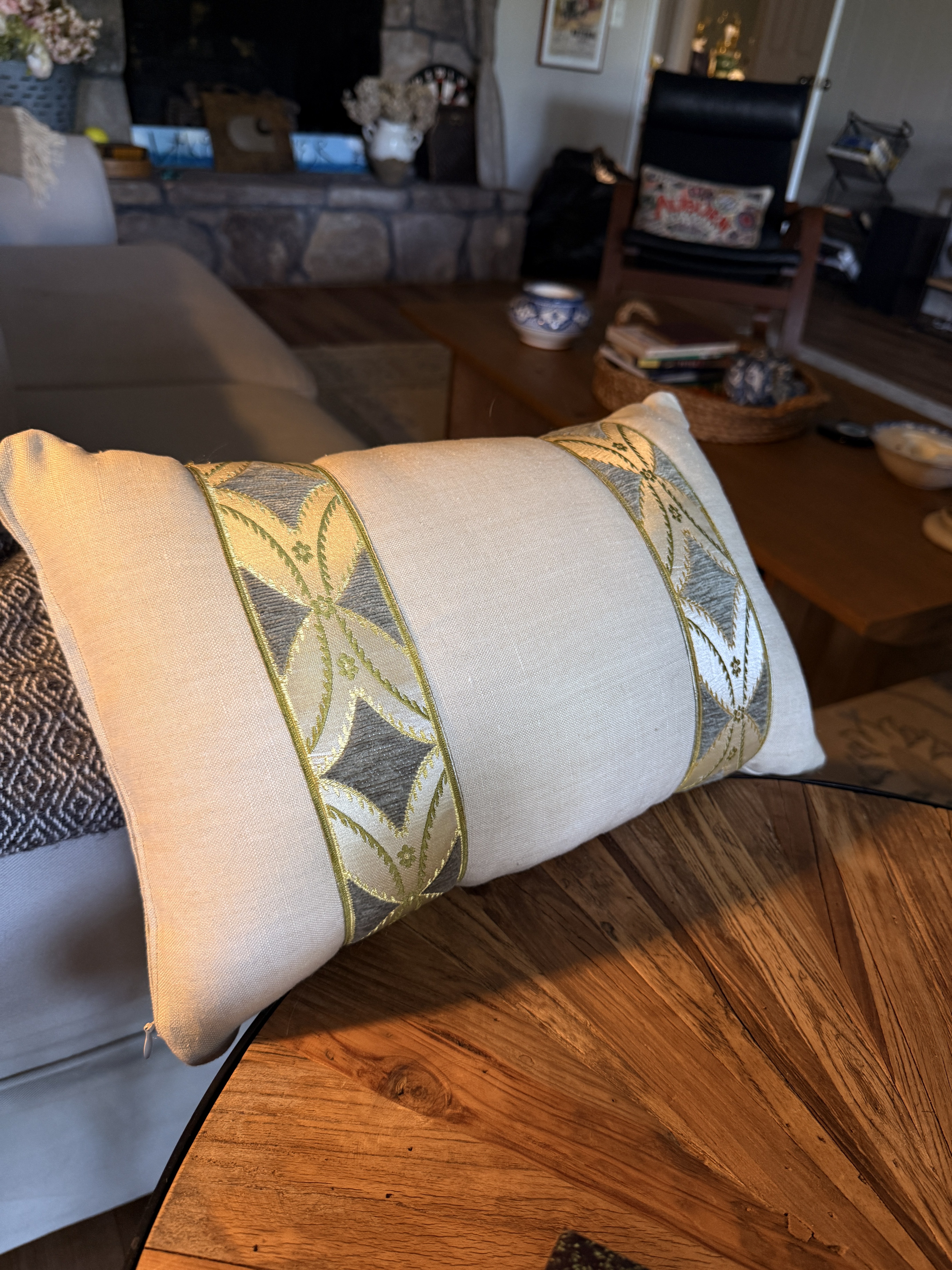 Handmade pillow with a patterned fabric band