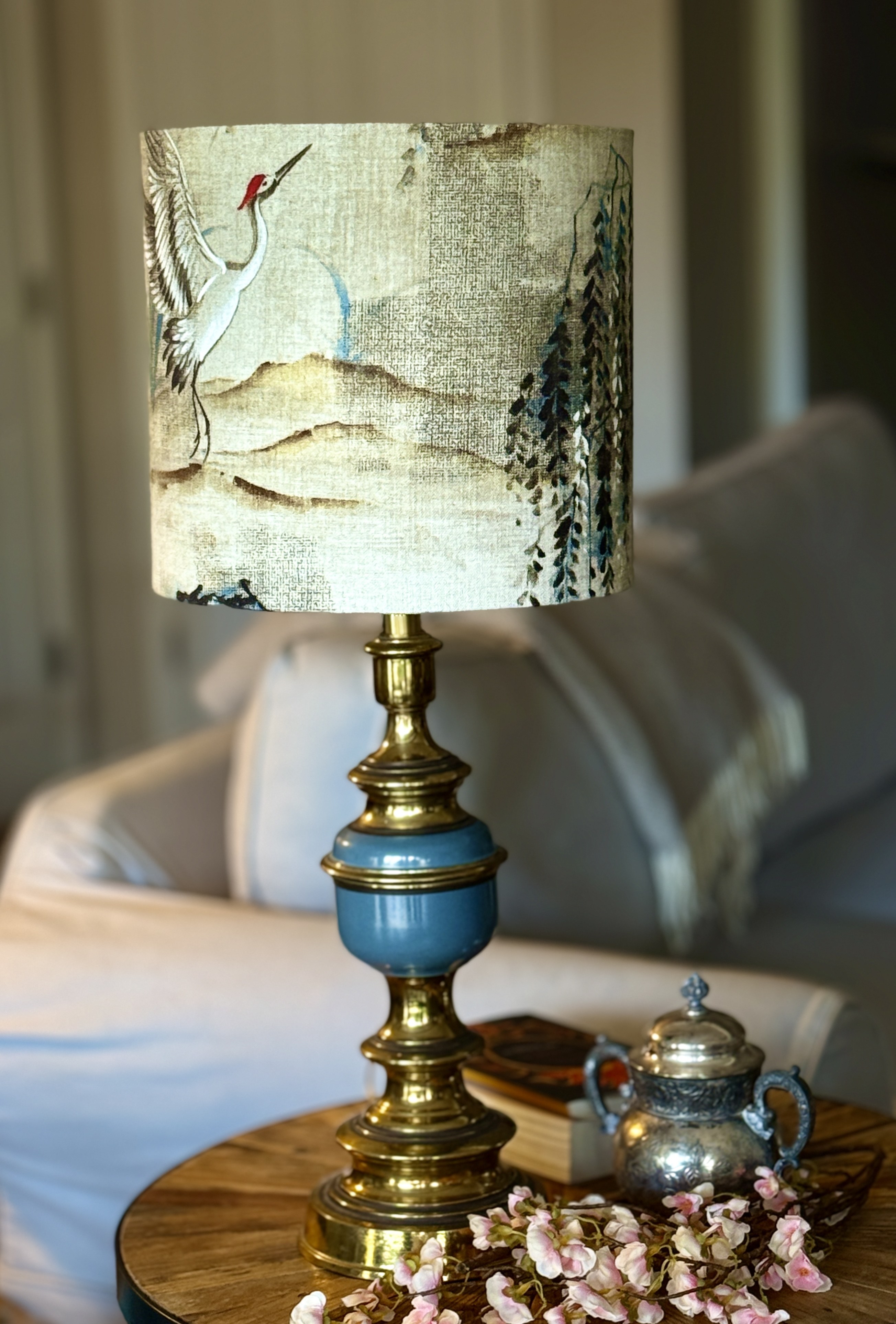 Restored blue and brass table lamp with a handcrafted crane shade