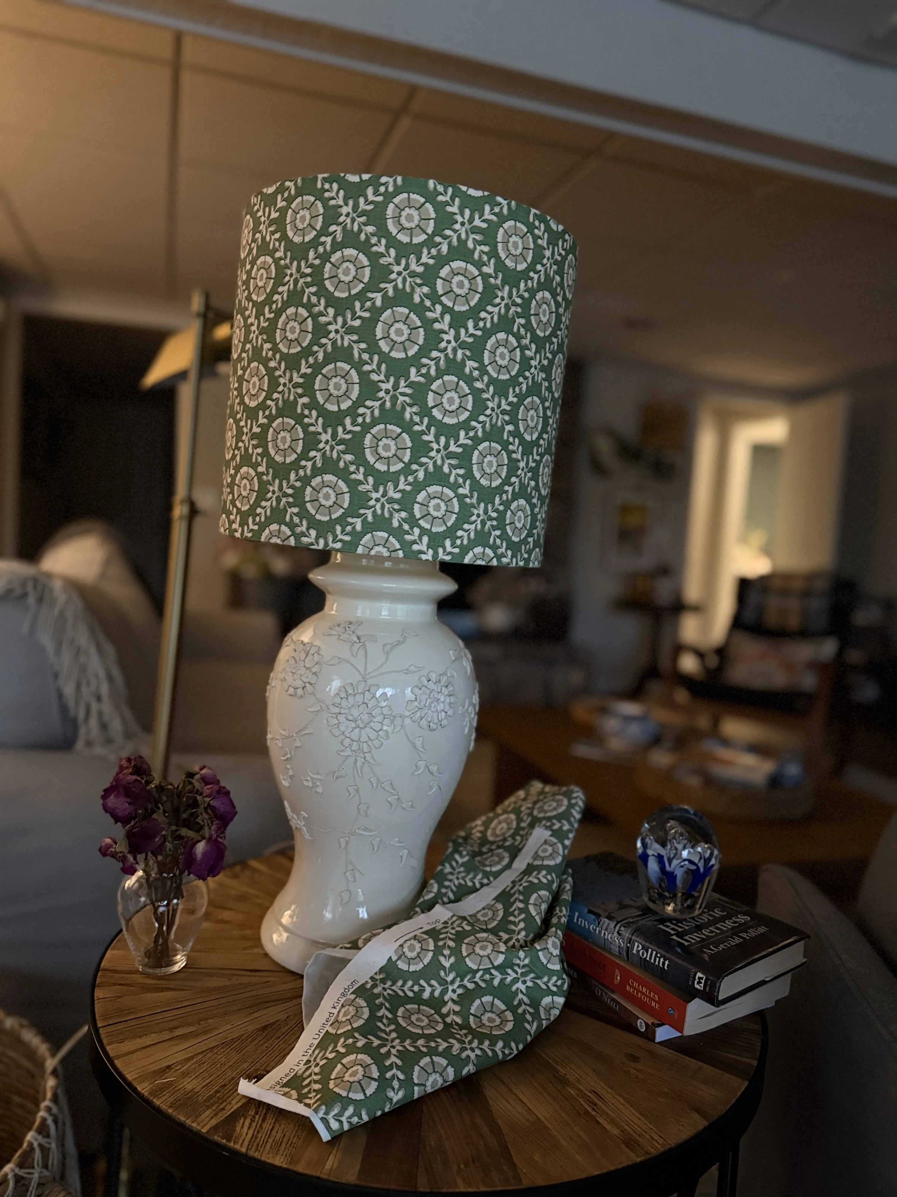 Ivory floral ginger jar lamp with a woven sage shade