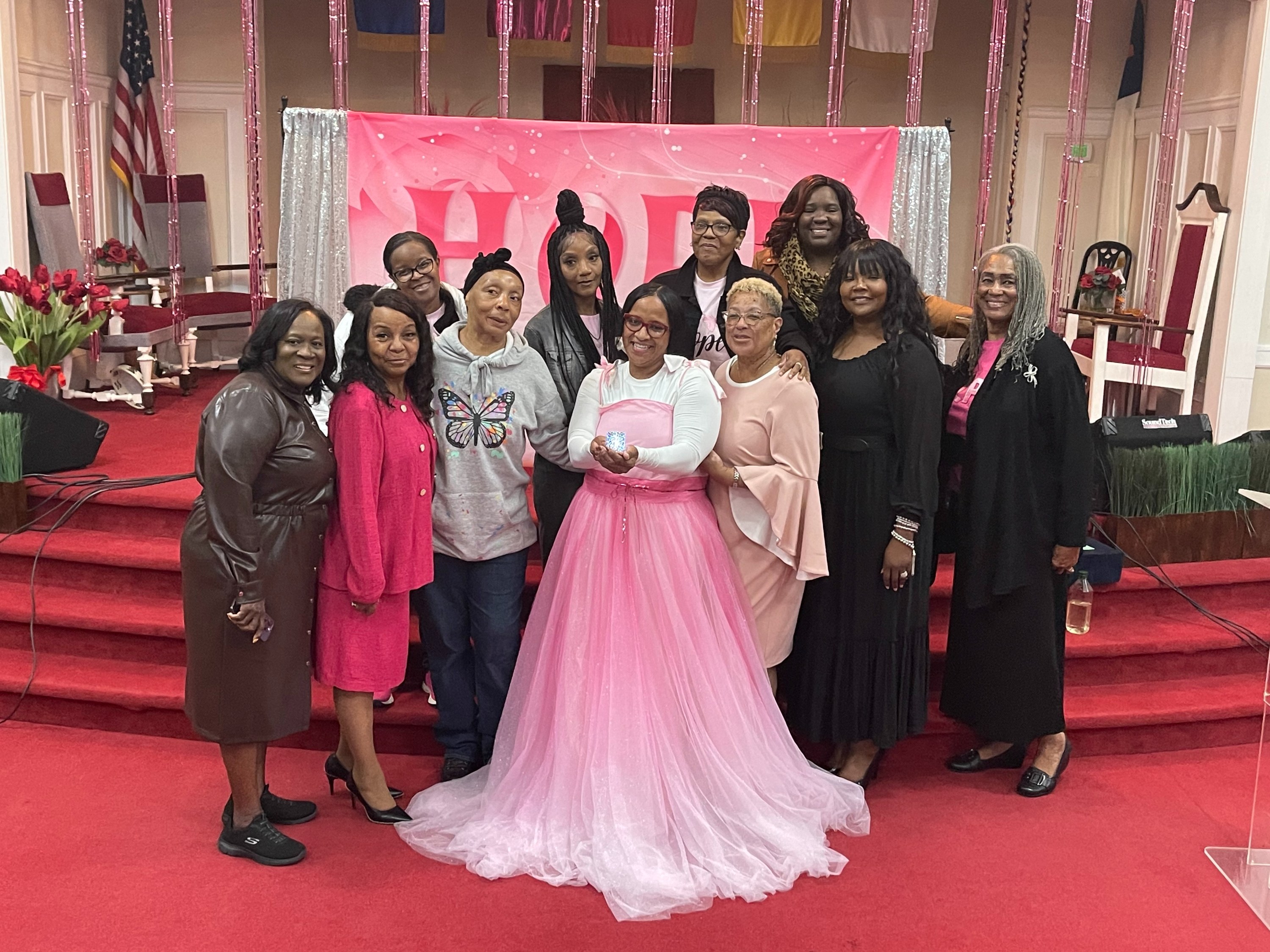 Members of the Daw of a New Day community at a cancer awareness gathering