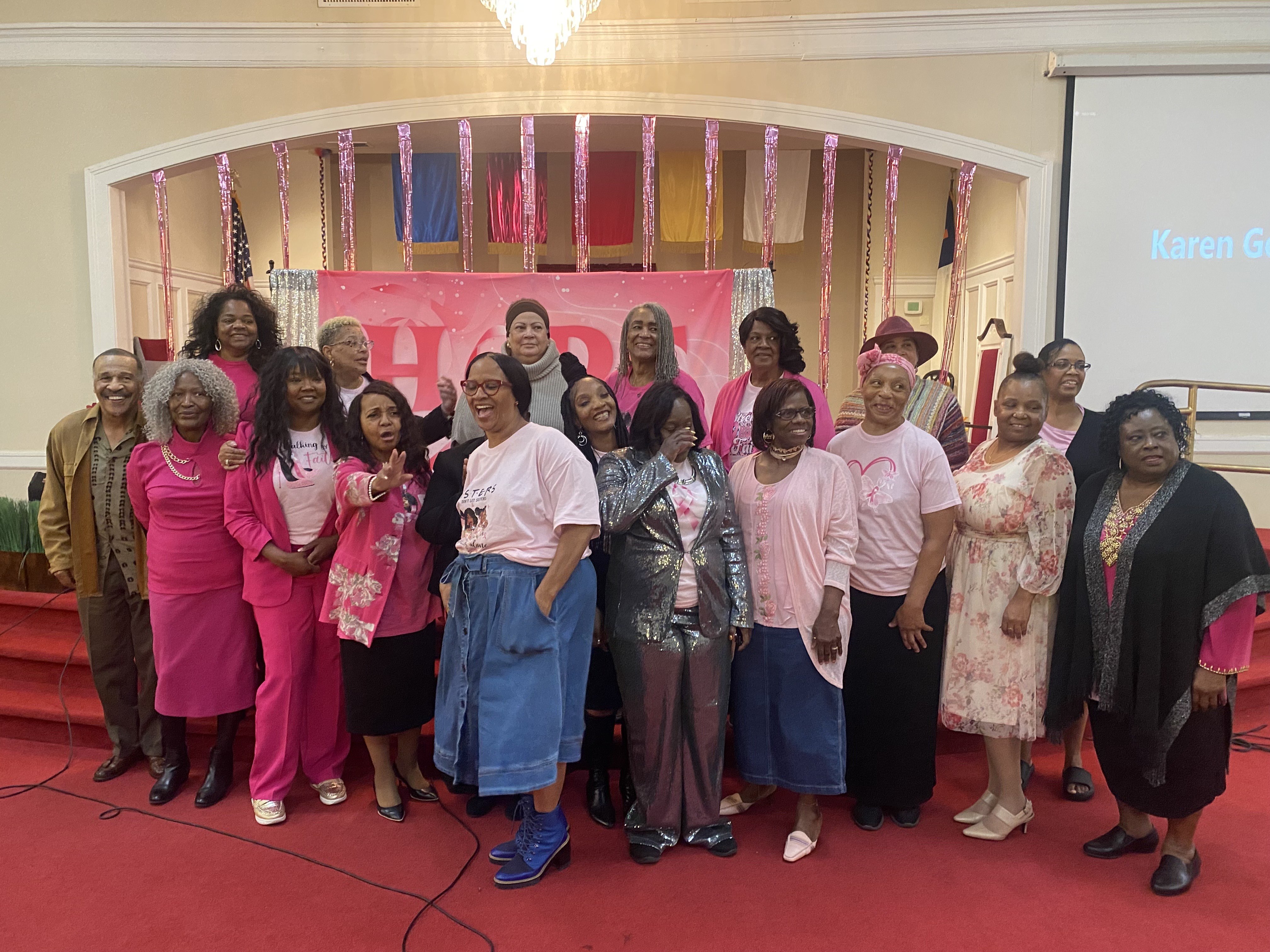 Daw of a New Day community members at a breast cancer awareness celebration