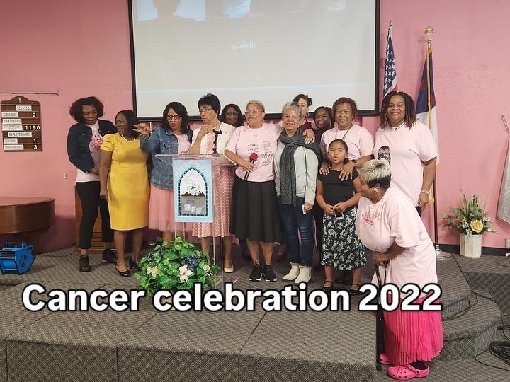 Cancer awareness celebration backdrop and balloon display