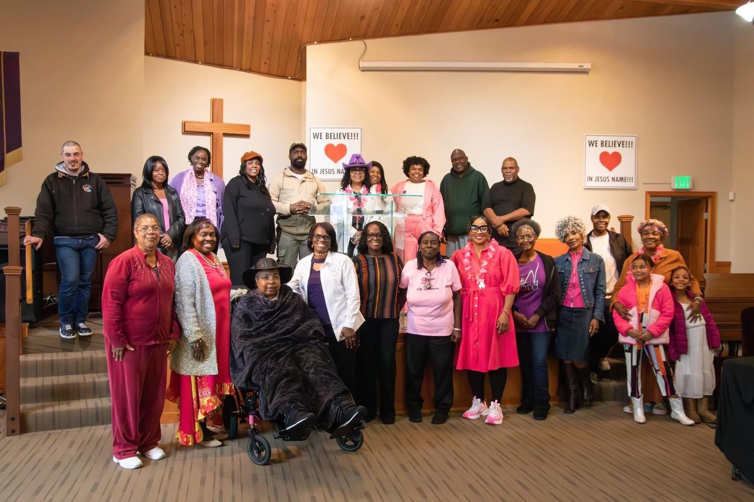 Daw of a New Day community members gathered together at a cancer awareness event