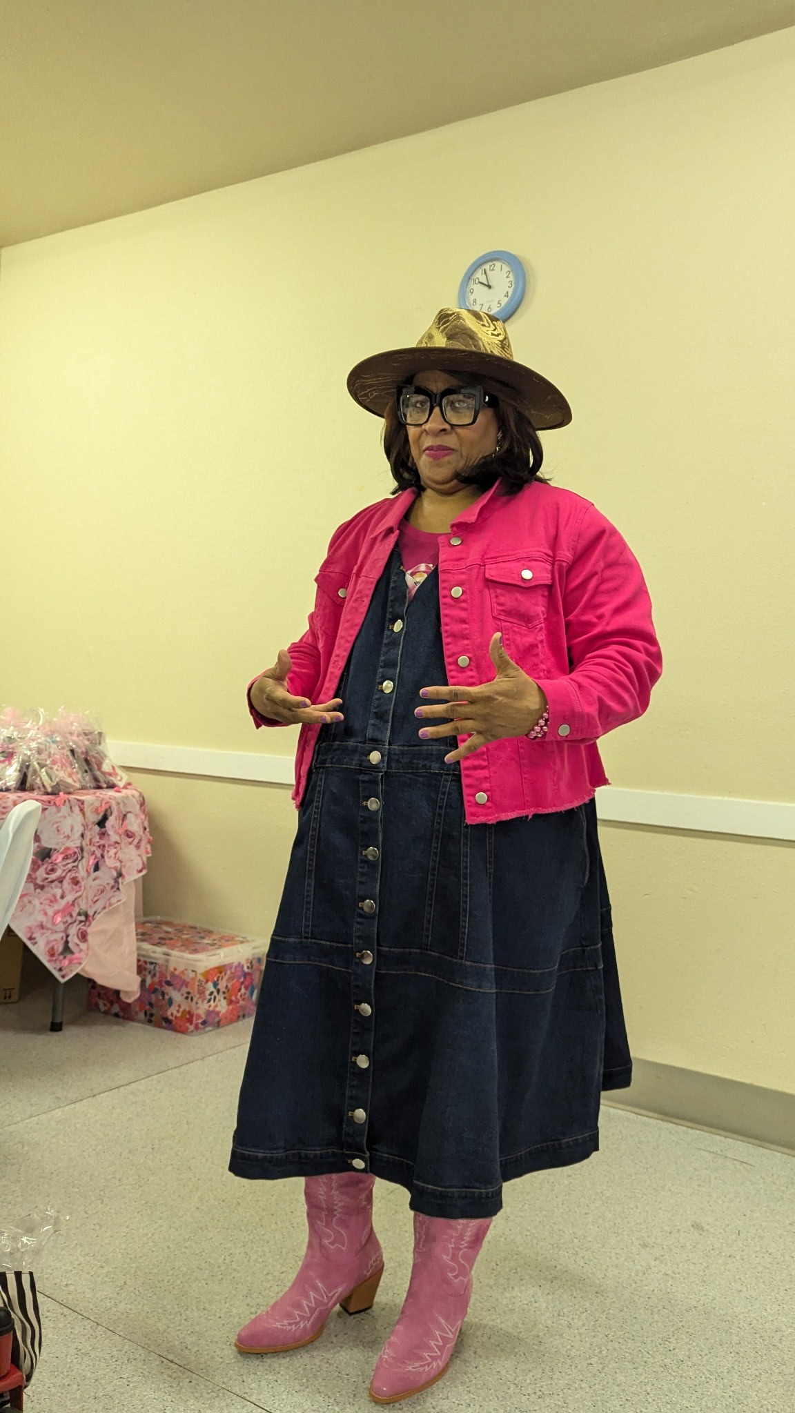 A guest in pink at a cancer awareness celebration
