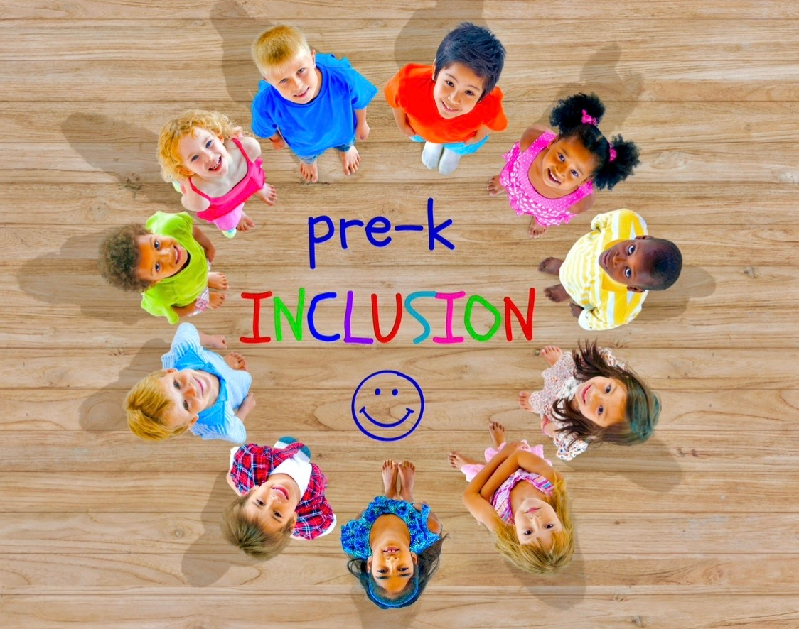 Educator supporting children during a classroom activity