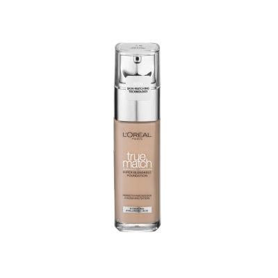 Neutral foundation bottle on a soft blush background