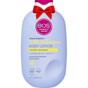 Lavender eos Shea Better Vanilla Cashmere body lotion bottle with a red bow, 16 fl oz