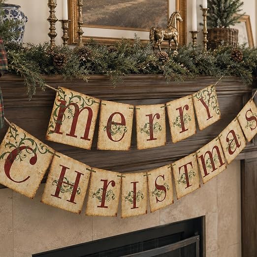 Vintage Merry Christmas banner with red lettering and green flourishes on cream cards hung across a decorated mantel