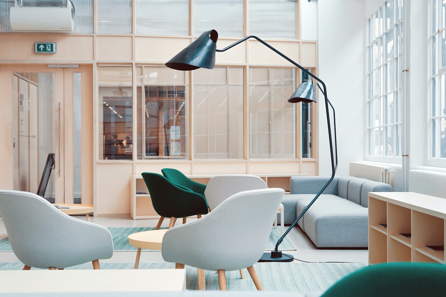 Colleagues collaborating around a table in a bright office
