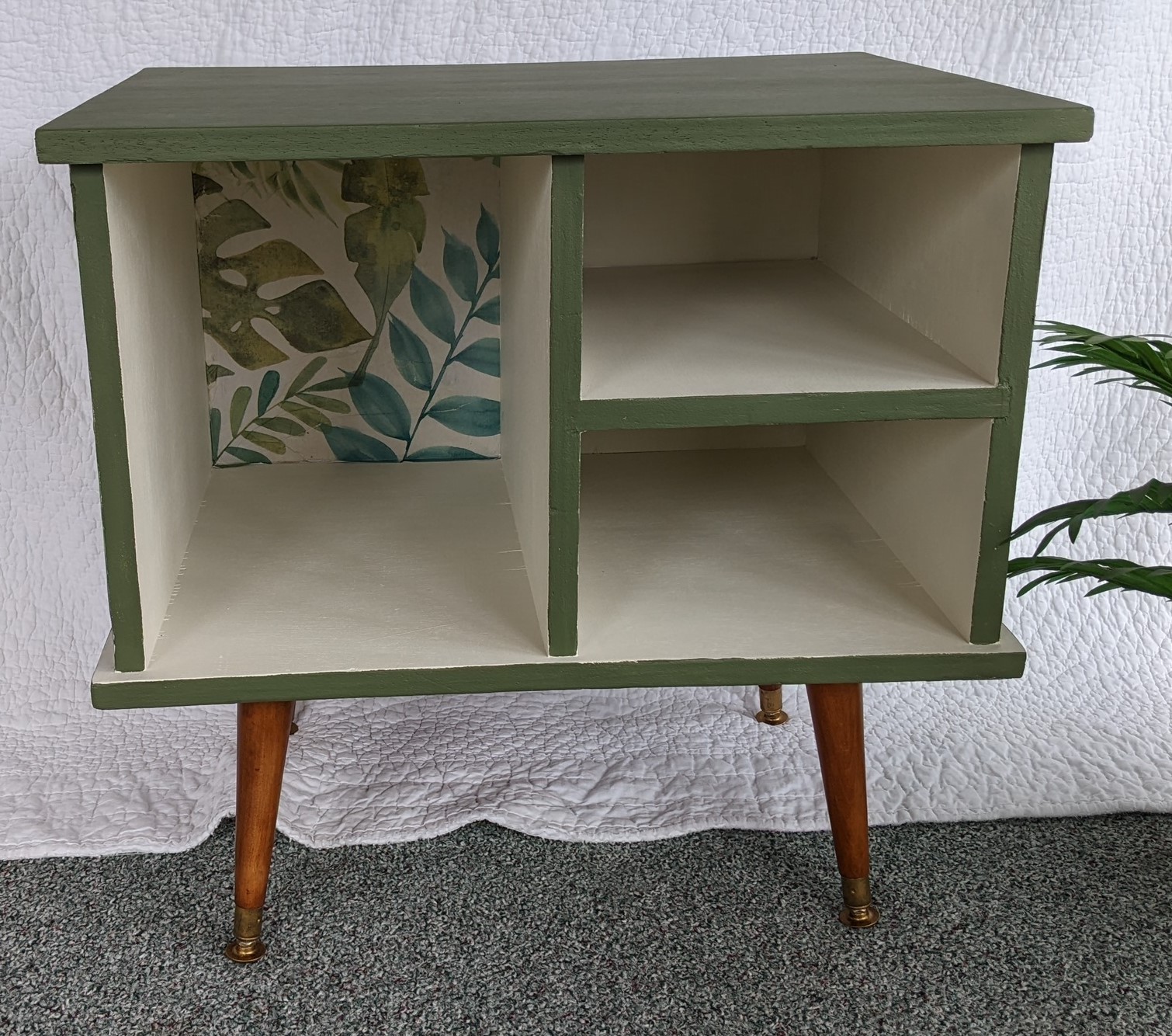 Small cabinet with a botanical decoupage panel inside the door