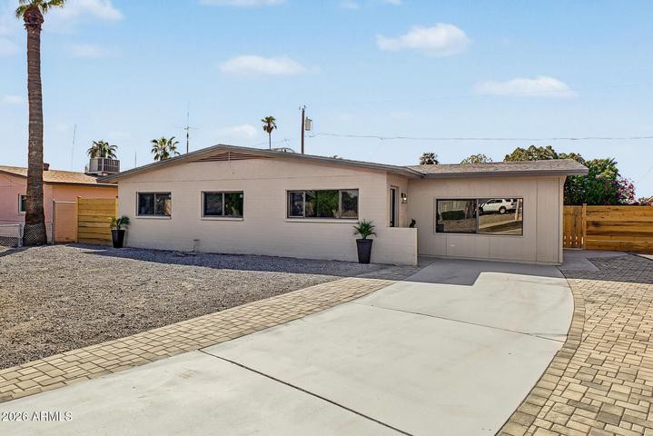 Front exterior of 3230 W Cortez Ave in Phoenix, showing the home and driveway