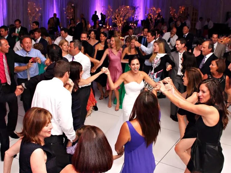 Guests dancing at an Alaska wedding reception