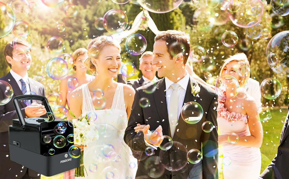 Couple surrounded by bubbles at their celebration