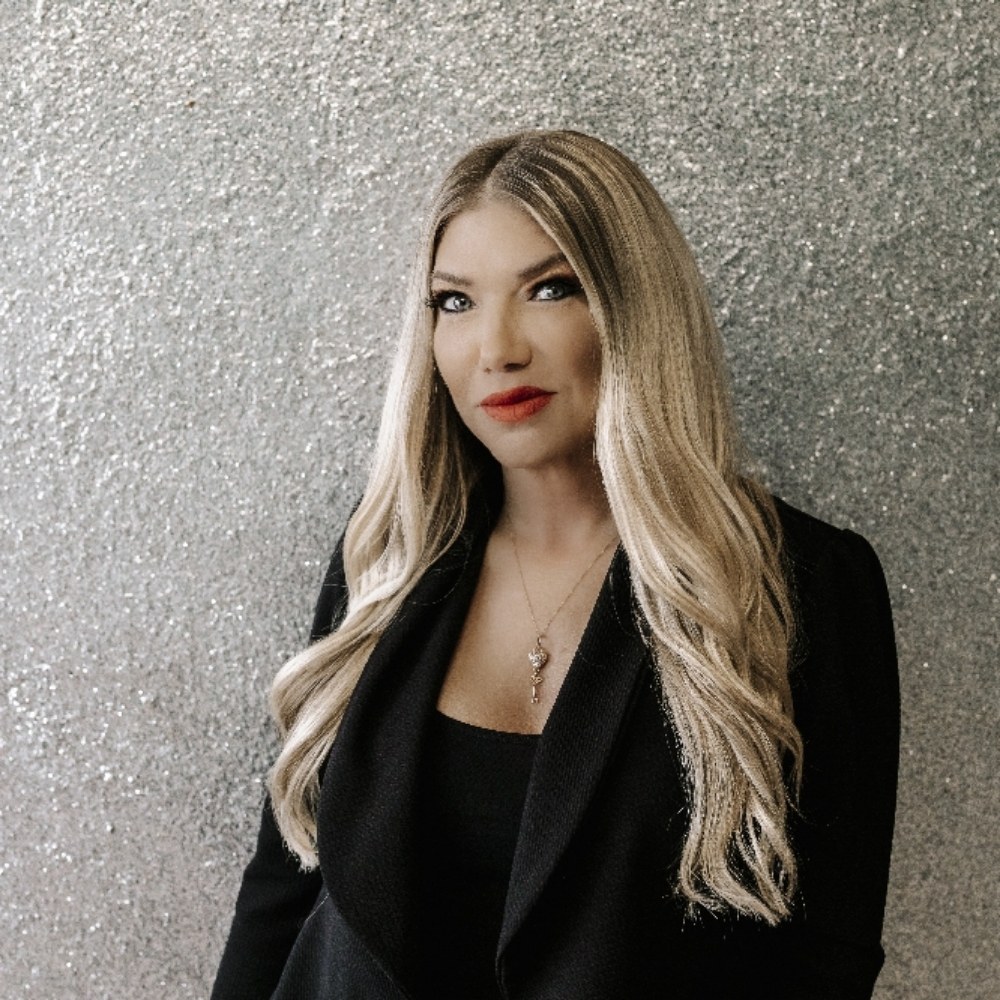 Salon Demetri client portrait against a sparkling backdrop